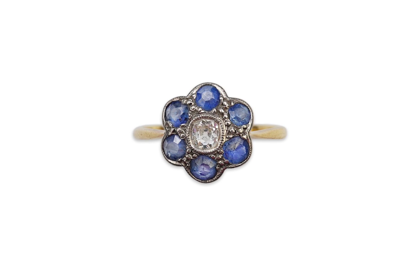 A sapphire and diamond cluster ring, early 20th century